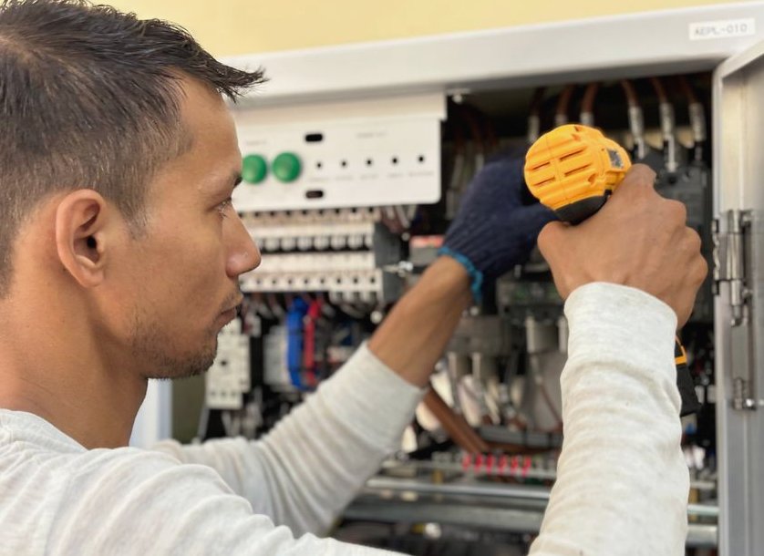 Photo of controller and zone wiring repair work
